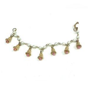 Vintage bracelet. Gold and pearl chain trumpet style flowers with pink stone
